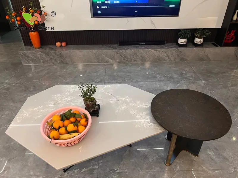 a television and a bowl of fruit on a table
